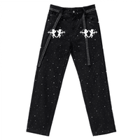Black jeans with white embellishments on a white background